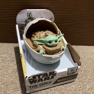 The child mandalorian and pram Rc Star Wars